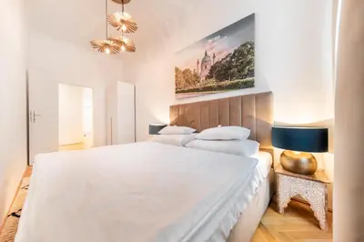 Ein Bett oder Betten in einem Zimmer der Unterkunft Smile Apartments Döbling