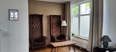 Ein Sitzbereich in der Unterkunft XuBa ApartmentRooms I Wien Messe Prater I Küchenzeile