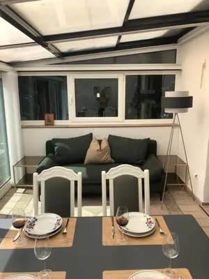 Ein Sitzbereich in der Unterkunft Garden View Apartment