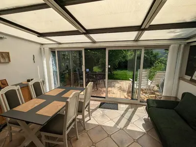 Ein Sitzbereich in der Unterkunft Garden View Apartment