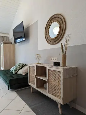TV/Unterhaltungsangebot in der Unterkunft Garden View Apartment