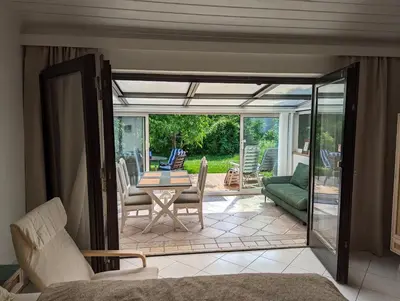 Ein Sitzbereich in der Unterkunft Garden View Apartment