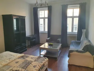 Ein Sitzbereich in der Unterkunft Spacious Apartment near the center