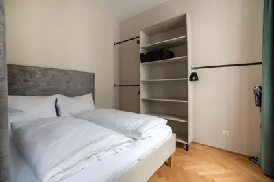 Ein Bett oder Betten in einem Zimmer der Unterkunft Hochwertiges Apartment mit direkter Anbindung zum Zentrum in hippen Viertel