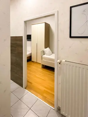 Ein Bett oder Betten in einem Zimmer der Unterkunft Marios Luxus Apartment