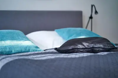 Ein Bett oder Betten in einem Zimmer der Unterkunft Trendy Apartment zentral gelegen