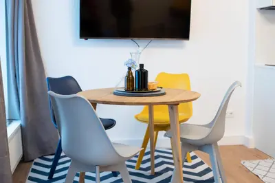 TV/Unterhaltungsangebot in der Unterkunft Design city apartment with free parking near Stadthalle