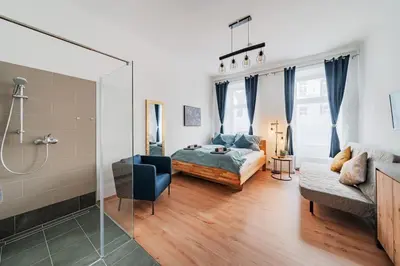 Ein Bett oder Betten in einem Zimmer der Unterkunft 3 Bedrooms - 75sqm - 15 Min. City Center