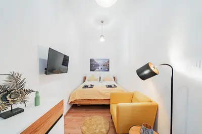 Ein Bett oder Betten in einem Zimmer der Unterkunft 3 Bedrooms - 75sqm - 15 Min. City Center