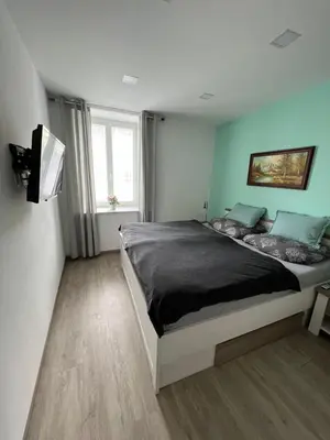 Ein Bett oder Betten in einem Zimmer der Unterkunft Appartement beim Schloss