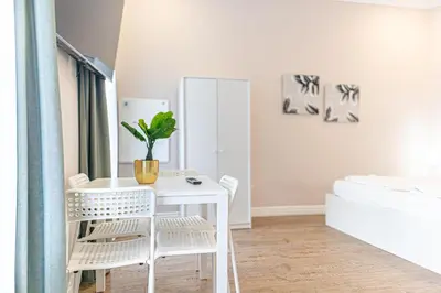Ein Bett oder Betten in einem Zimmer der Unterkunft Stylish Apartment Wiener Stadthalle