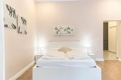 Ein Bett oder Betten in einem Zimmer der Unterkunft Stylish Apartment Wiener Stadthalle