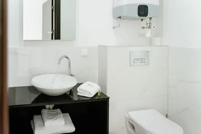 Ein Badezimmer in der Unterkunft Lamede SELF CHECK-IN