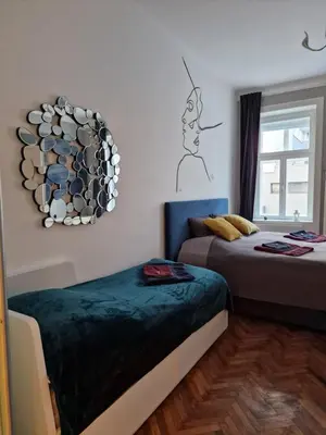Ein Bett oder Betten in einem Zimmer der Unterkunft 4 seasons apartment