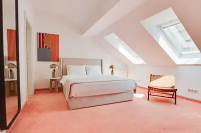 Ein Bett oder Betten in einem Zimmer der Unterkunft Atik Hotel Vienna