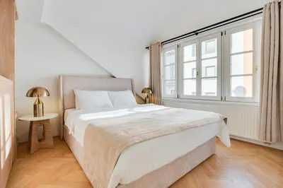 Ein Bett oder Betten in einem Zimmer der Unterkunft Atik Hotel Vienna