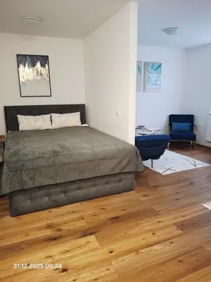 Ein Bett oder Betten in einem Zimmer der Unterkunft Lauro Apartment