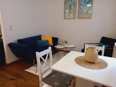 Ein Sitzbereich in der Unterkunft Lauro Apartment