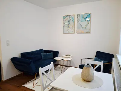 Ein Sitzbereich in der Unterkunft Lauro Apartment