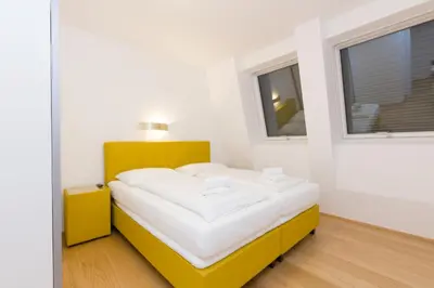 Ein Bett oder Betten in einem Zimmer der Unterkunft Central Riverside Residences