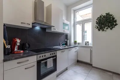 Küche/Küchenzeile in der Unterkunft Cozy, generous City Apartment - 10 min to city-centre - Contactless 24h Check-In