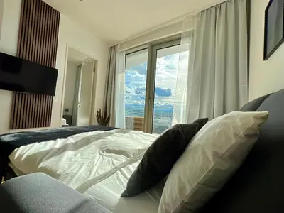 Ein Bett oder Betten in einem Zimmer der Unterkunft Cozy Property at Belvedere