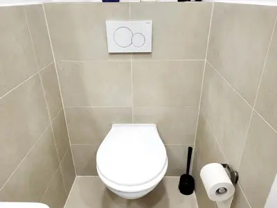 Ein Badezimmer in der Unterkunft Donaufelder City Apartment