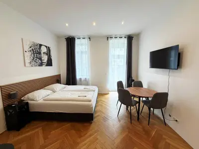 Ein Bett oder Betten in einem Zimmer der Unterkunft Donaufelder City Apartment