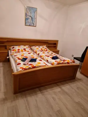 Ein Bett oder Betten in einem Zimmer der Unterkunft DrKarlRennerGarten