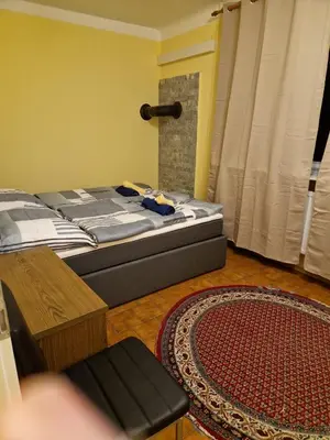 Ein Bett oder Betten in einem Zimmer der Unterkunft DrKarlRennerGarten