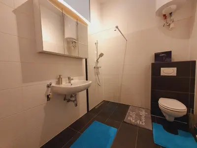 Ein Badezimmer in der Unterkunft Savoir Vivre Apartments Rosinagasse