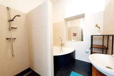 Ein Badezimmer in der Unterkunft Savoir Vivre Apartments Rosinagasse