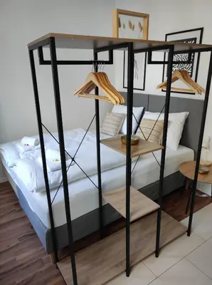 Ein Bett oder Betten in einem Zimmer der Unterkunft ROKSOX-Home Meidling Schloss Schönbrunn