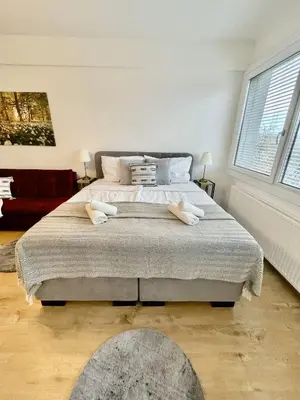 Ein Bett oder Betten in einem Zimmer der Unterkunft City Center Apartments am Schwedenplatz
