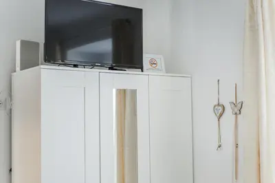 TV/Unterhaltungsangebot in der Unterkunft Modernes Appartement nahe U-Bahn und Schönbrunn