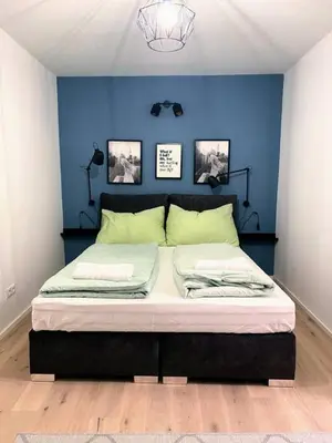 Ein Bett oder Betten in einem Zimmer der Unterkunft Summer Dream - Air Conditioned balcony flat on 2 floors