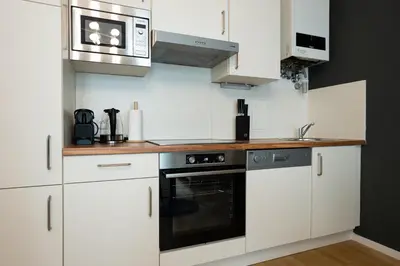 Küche/Küchenzeile in der Unterkunft Aesthetic newly renovated apartment located near Belvedere Castle, 15 minutes from Stephansplatz