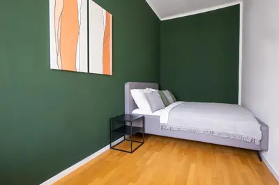 Ein Bett oder Betten in einem Zimmer der Unterkunft Modern apartment near Belvedere Castle