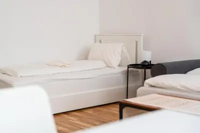 Ein Bett oder Betten in einem Zimmer der Unterkunft Vienna City Apartments 1150 Vienna