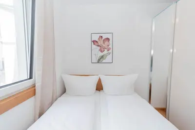 Ein Bett oder Betten in einem Zimmer der Unterkunft Modern apartment with big balcony near city center
