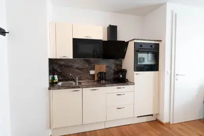 Küche/Küchenzeile in der Unterkunft Modern apartment with big balcony near city center
