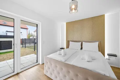 Ein Bett oder Betten in einem Zimmer der Unterkunft Apartments nähe Schloss Schönbrunn